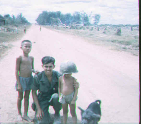 Delivering Candy to the Kids in Village at FSB Bandit Hill Nov 68